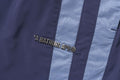A BATHING APE LINE CAMO METAL LOGO RELAXED FIT TRACK PANTS