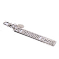 A BATHING APE METAL LOGO KEYCHAIN