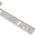 A BATHING APE METAL LOGO KEYCHAIN