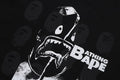 A BATHING APE SPRAY PRINT MULTI LOGO RELAXED FIT TEE