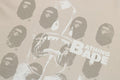A BATHING APE SPRAY PRINT MULTI LOGO RELAXED FIT TEE