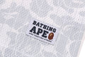 A BATHING APE CAMO STRIPE BASEBALL LOGO RELAXED FIT TEE