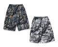A BATHING APE TREE EDGE CAMO CARGO SHORTS