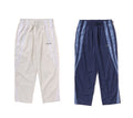 A BATHING APE LINE CAMO METAL LOGO RELAXED FIT TRACK PANTS