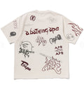 A BATHING APE OVERALL PRINT RELAXED FIT TEE