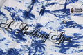 A BATHING APE PLAM TREE CAMO RELAXED FIT BEACH SHORTS