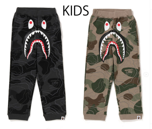 A BATHING APE BAPE KIDS LAYERED LINE CAMO SHARK SWEATPANTS GLOW IN THE DARK