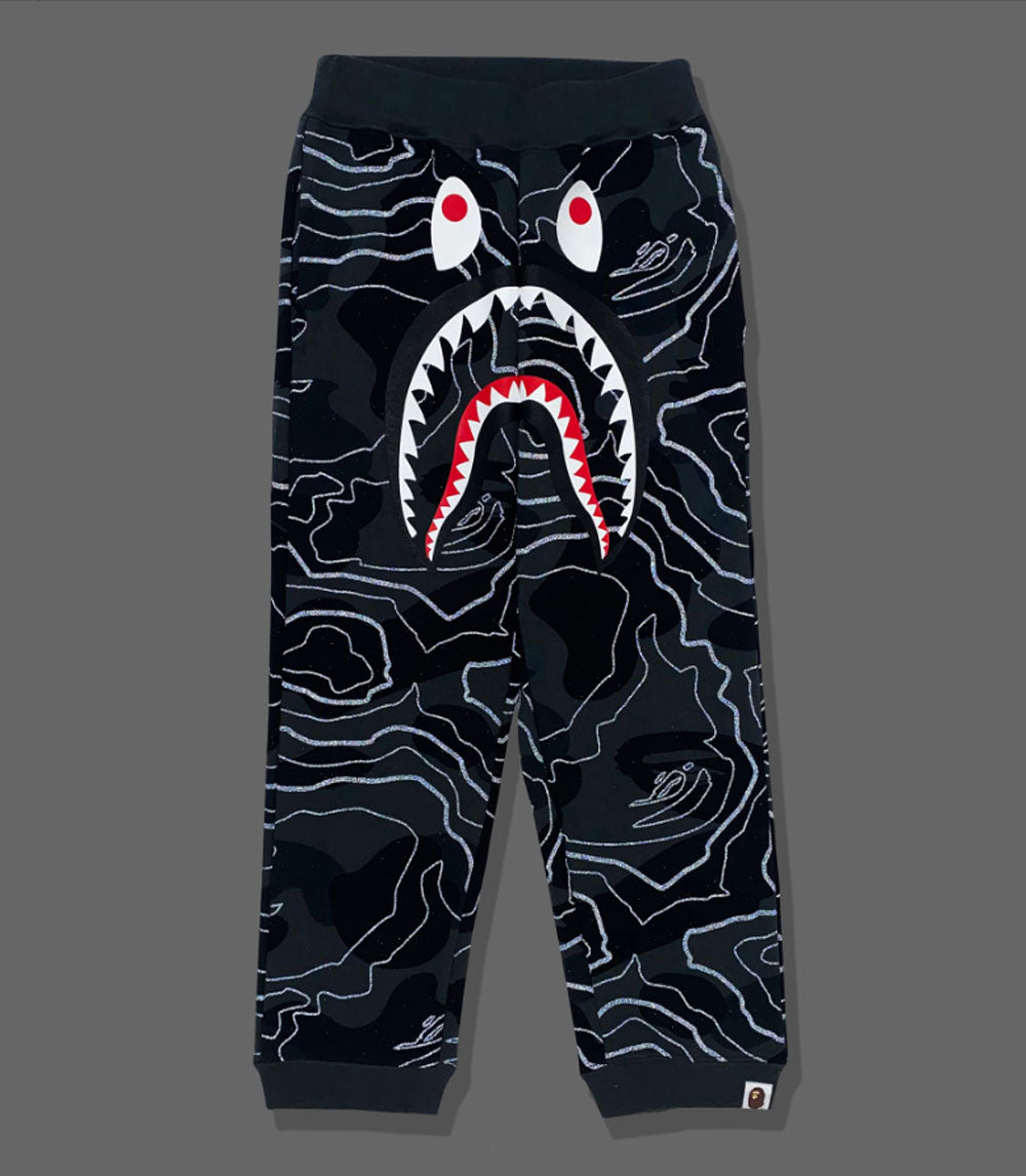 A BATHING APE BAPE KIDS LAYERED LINE CAMO SHARK SWEATPANTS GLOW IN THE DARK