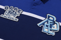 A BATHING APE COLOR BLOCKING OVERSIZED RUGBY POLO