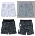 A BATHING APE TEXT CODE CAMO SWEAT SHORTS