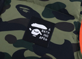A BATHING APE 1ST CAMO REVERSIBLE DOWN VEST