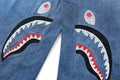 A BATHING APE Ladies' SHARK CROPPED DENIM PANTS