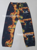 A BATHING APE TIE DYE TRACK PANTS